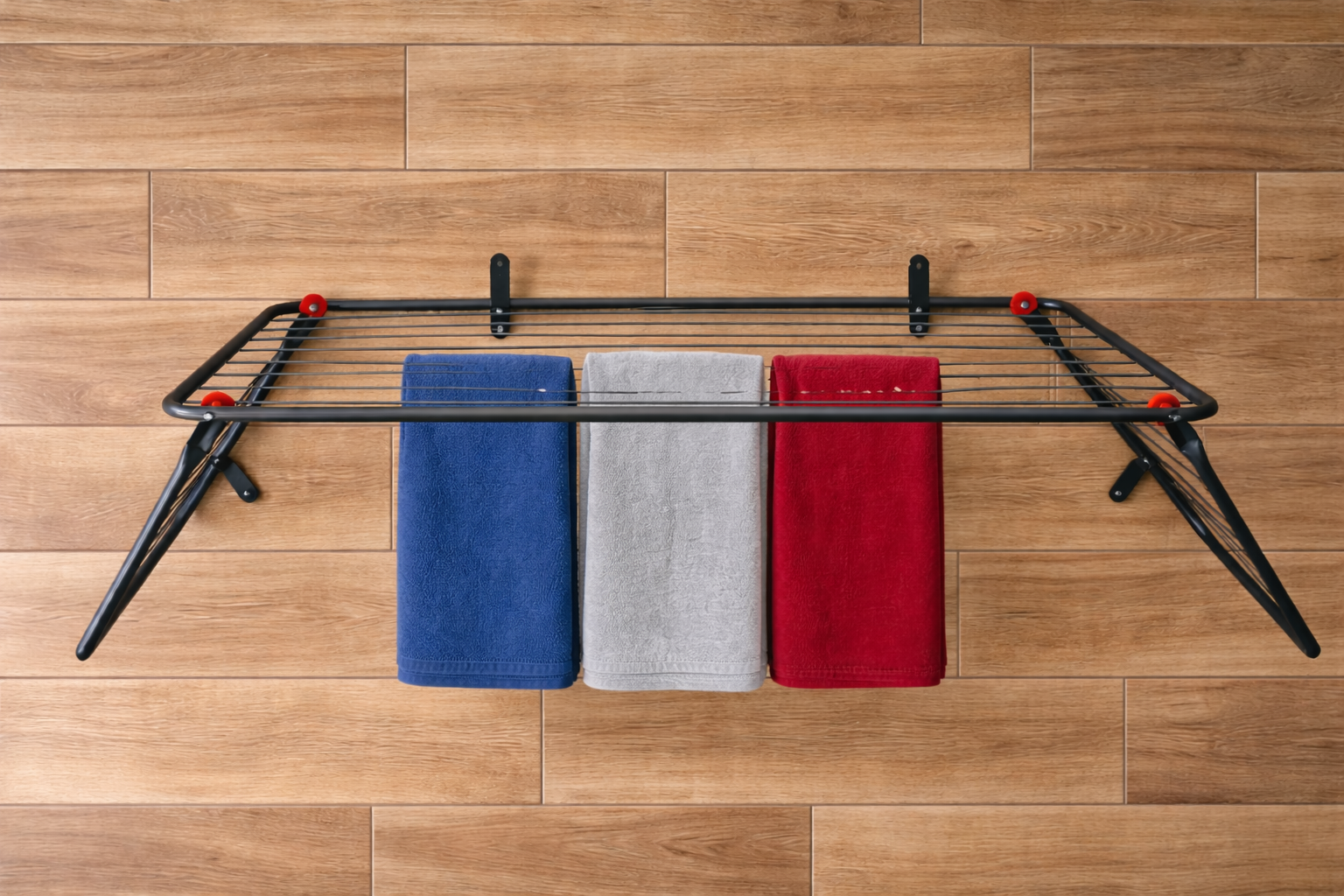 اول منشر حائط قابل للطي بجناح